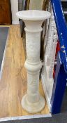 A carved alabaster column, height 99cm.