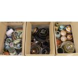 A large quantity of mixed studio pottery bowls, vases, etc.