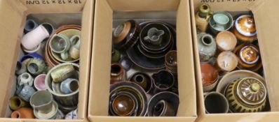 A large quantity of mixed studio pottery bowls, vases, etc.