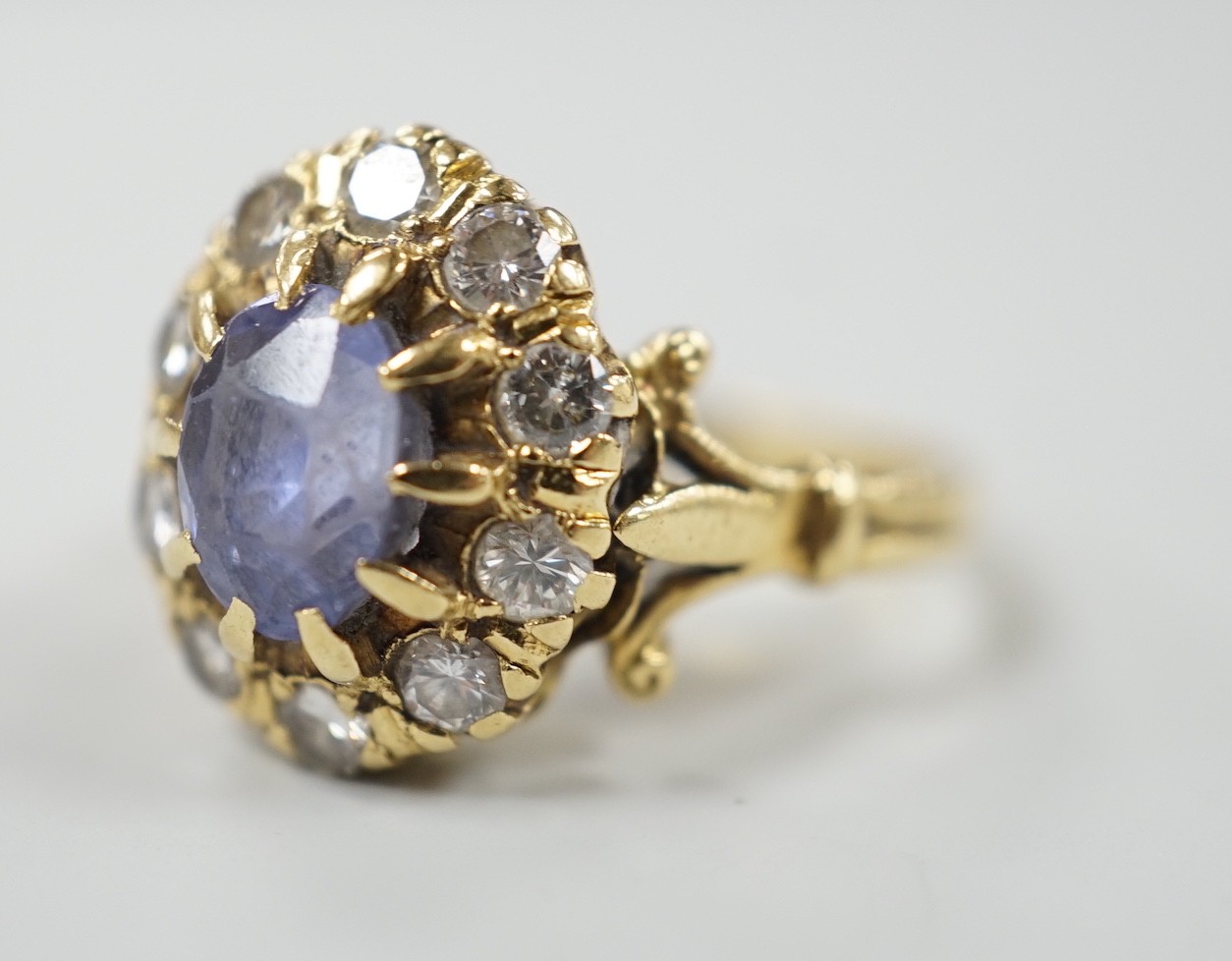 An early to mid 20th century yellow metal, sapphire and diamond set oval cluster dress ring, size - Image 2 of 4