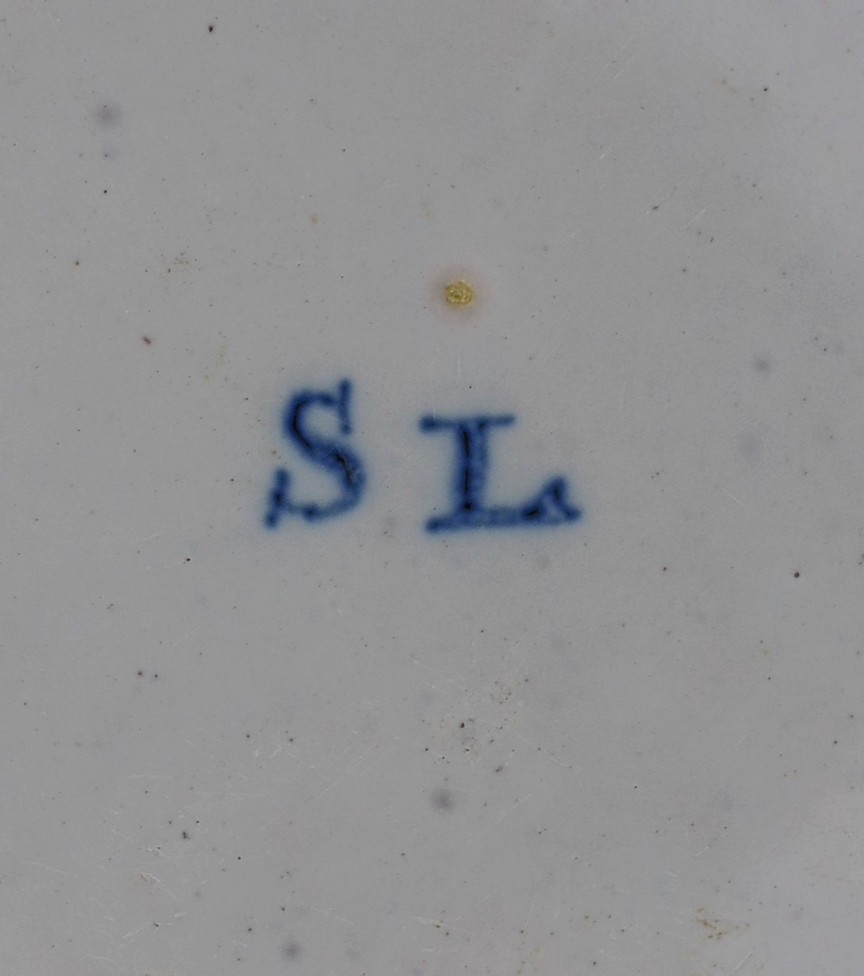 A large Strasbourg faience octagonal dish, c.1720-40, painted in blue with a basket of flowers, - Image 6 of 6