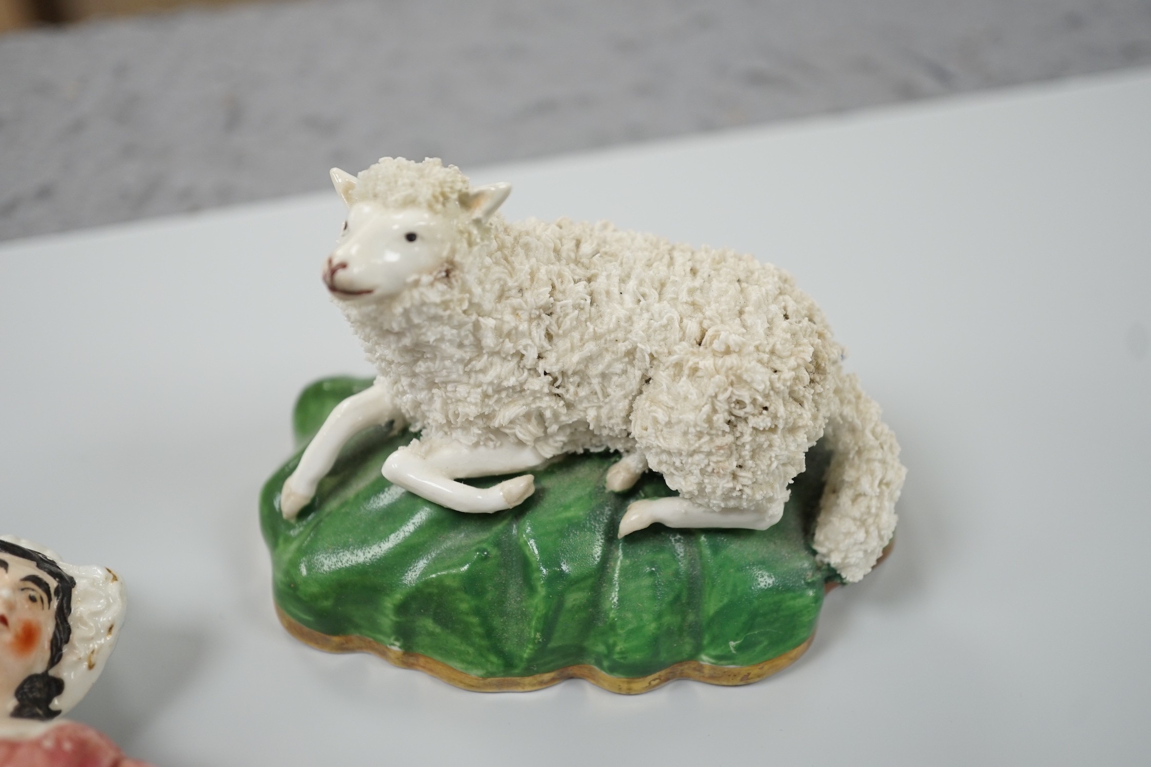 Three small Staffordshire models of recumbent sheep on oval mounted bases, together with a - Image 2 of 7