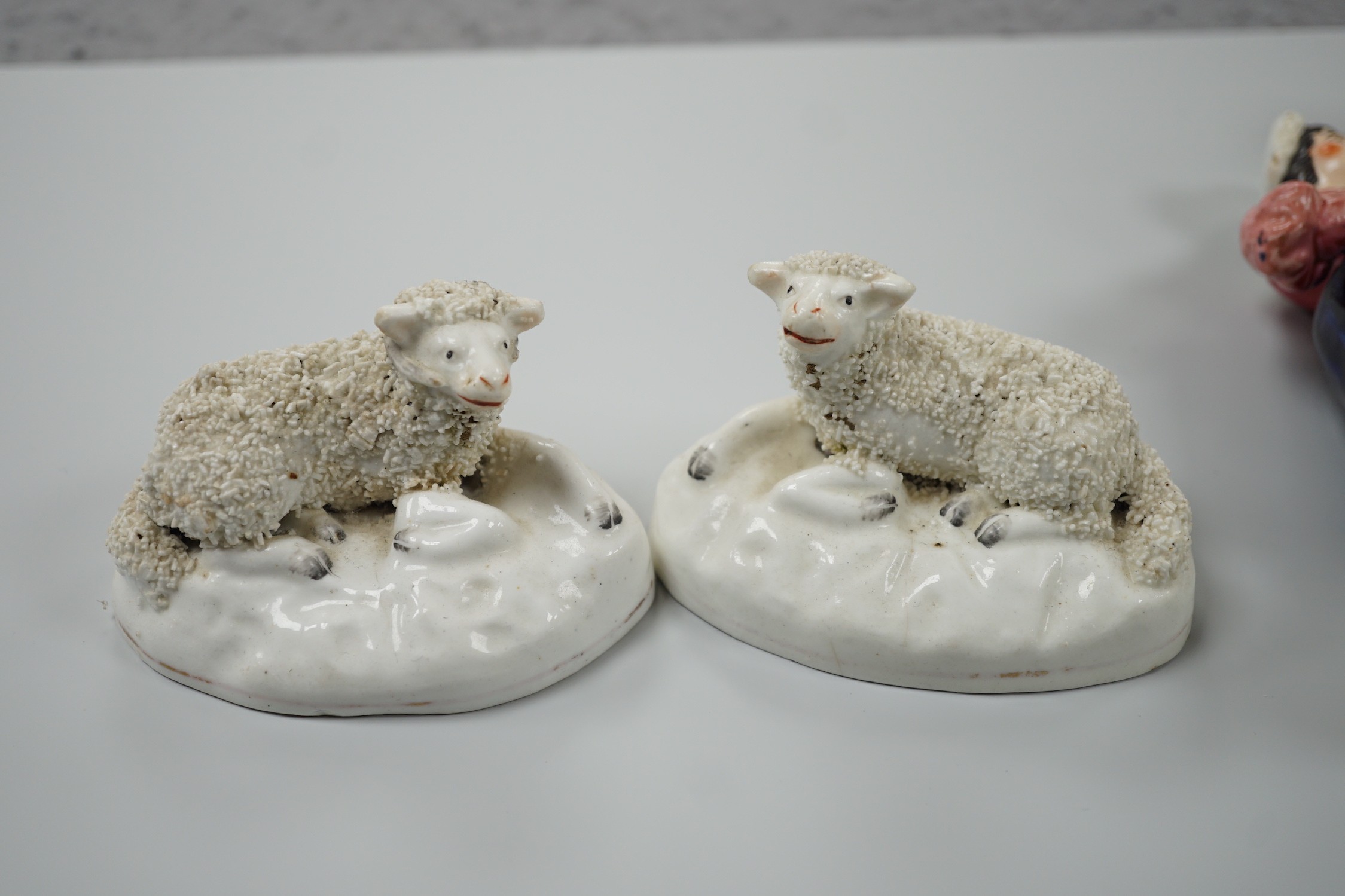 Three small Staffordshire models of recumbent sheep on oval mounted bases, together with a - Image 3 of 7