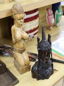 A group of African carvings, tallest figure 51cm