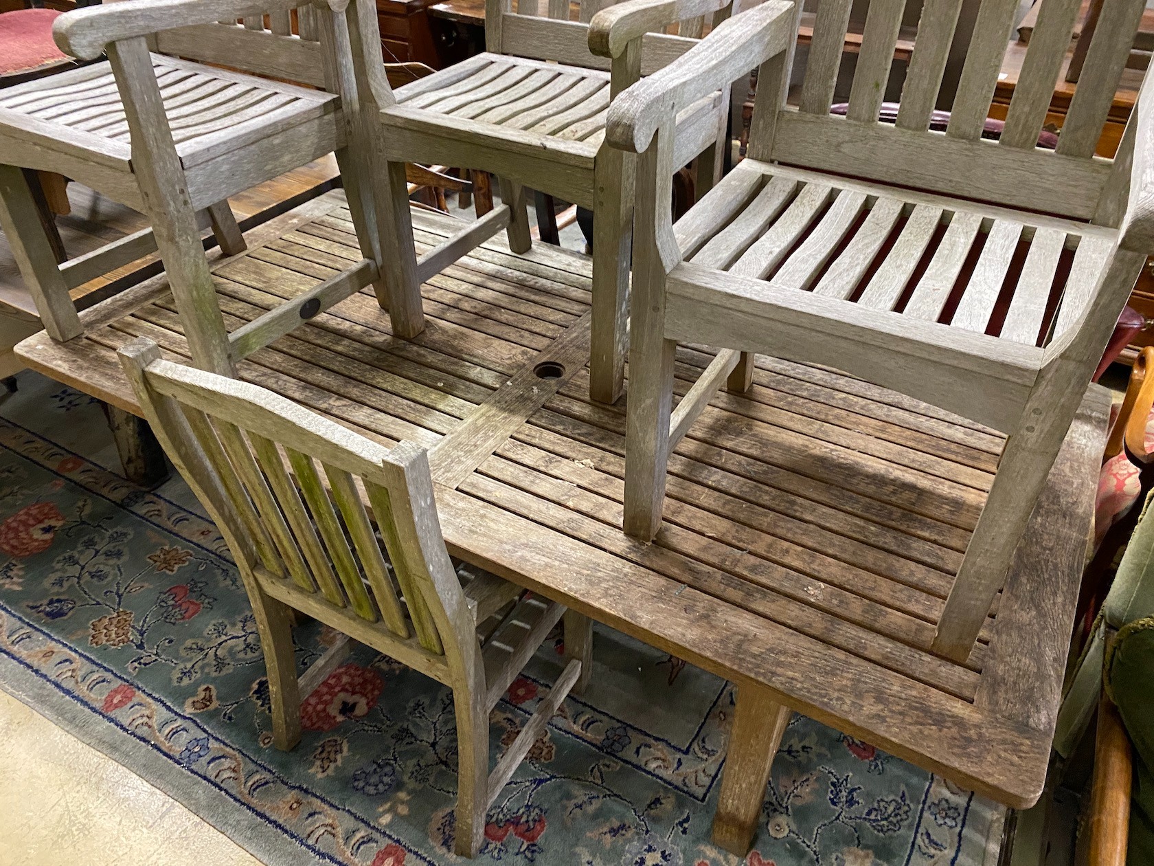 A rectangular weathered teak garden table, length 183cm, depth 92cm, height 73cm and four Lister - Image 3 of 3