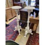 A pair of Victorian style painted cast iron pricket candlestands, height 122cm
