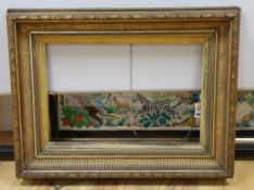 A late Victorian gilt gesso picture frame, aperture 52 x 34cm, overall 76 x 58cm
