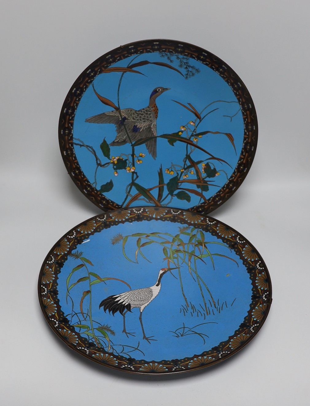 Two Japanese cloisonné enamel dishes, Meiji period, 39cm