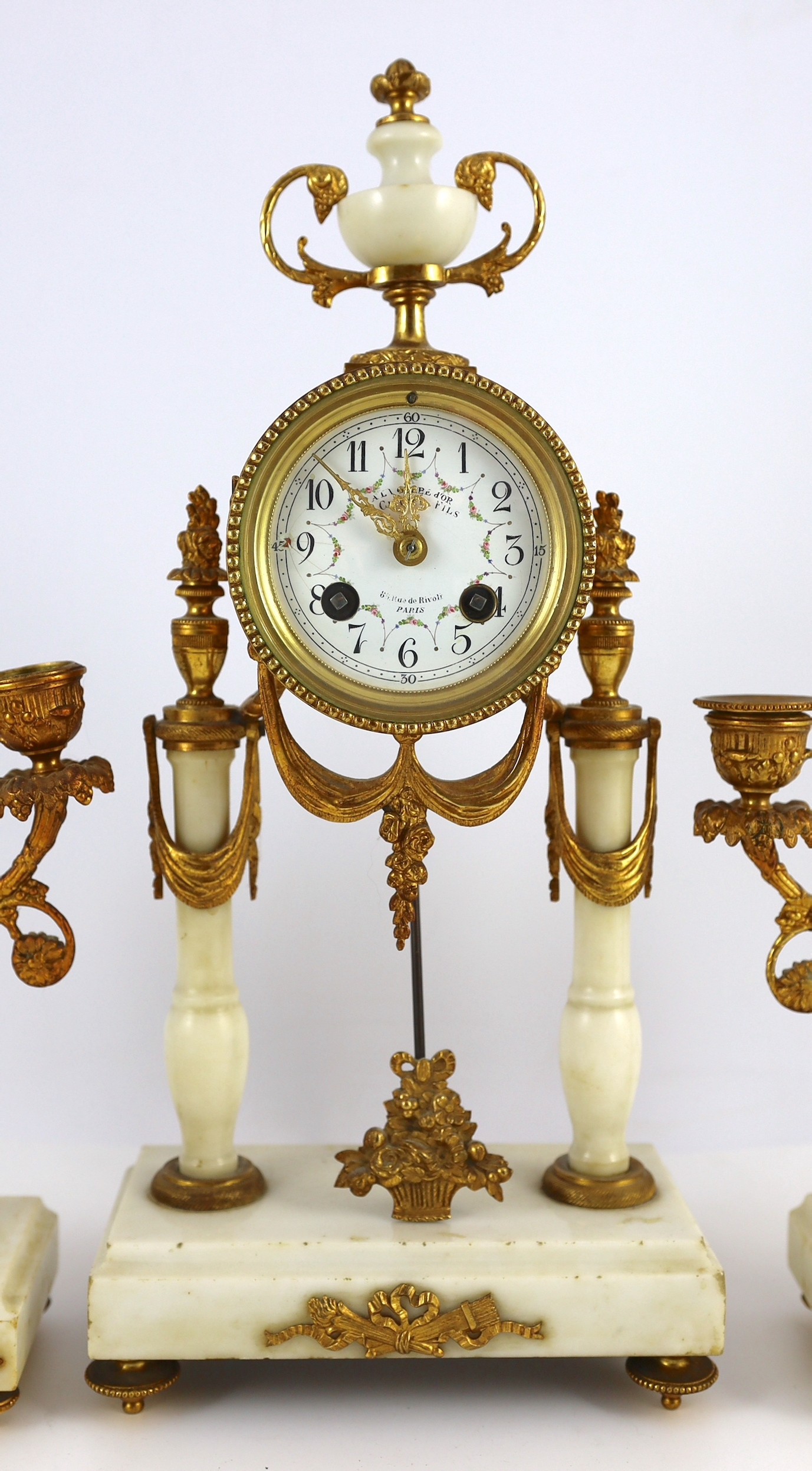 A Louis XVI style ormolu mounted white marble eight day mantel clock and a matching pair of twin - Image 2 of 4