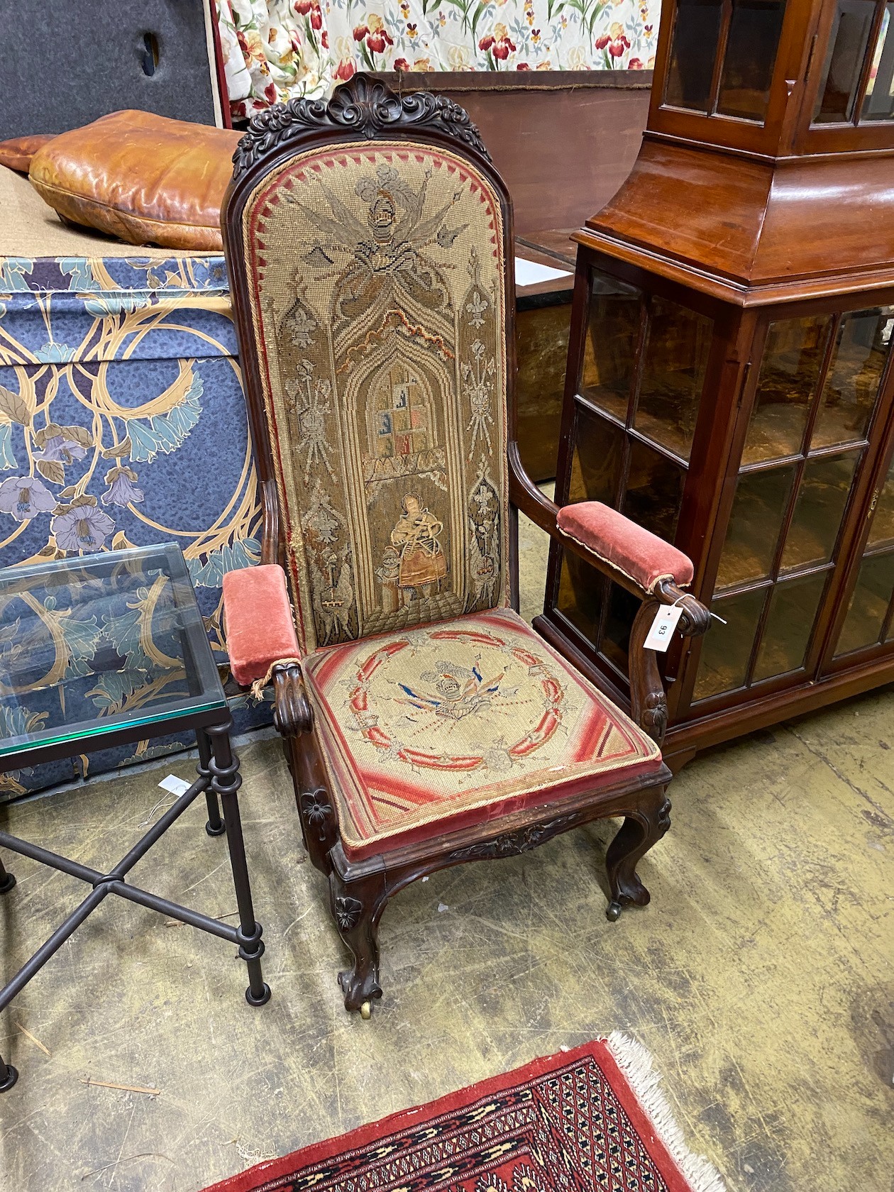 A Victorian carved rosewood elbow chair with tapestry seat and back, width 69cm, depth 47cm,