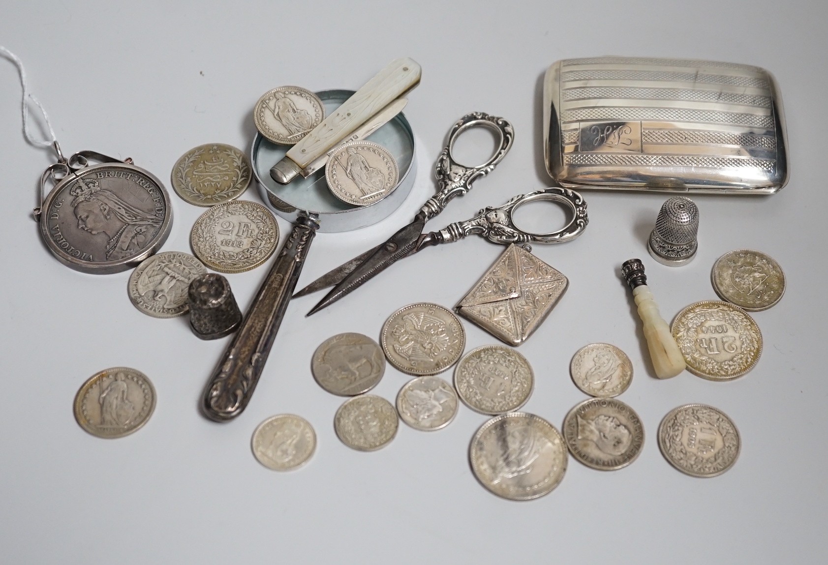 Miscellaneous small silver and white metal items including thimbles, a cigarette case, envelope