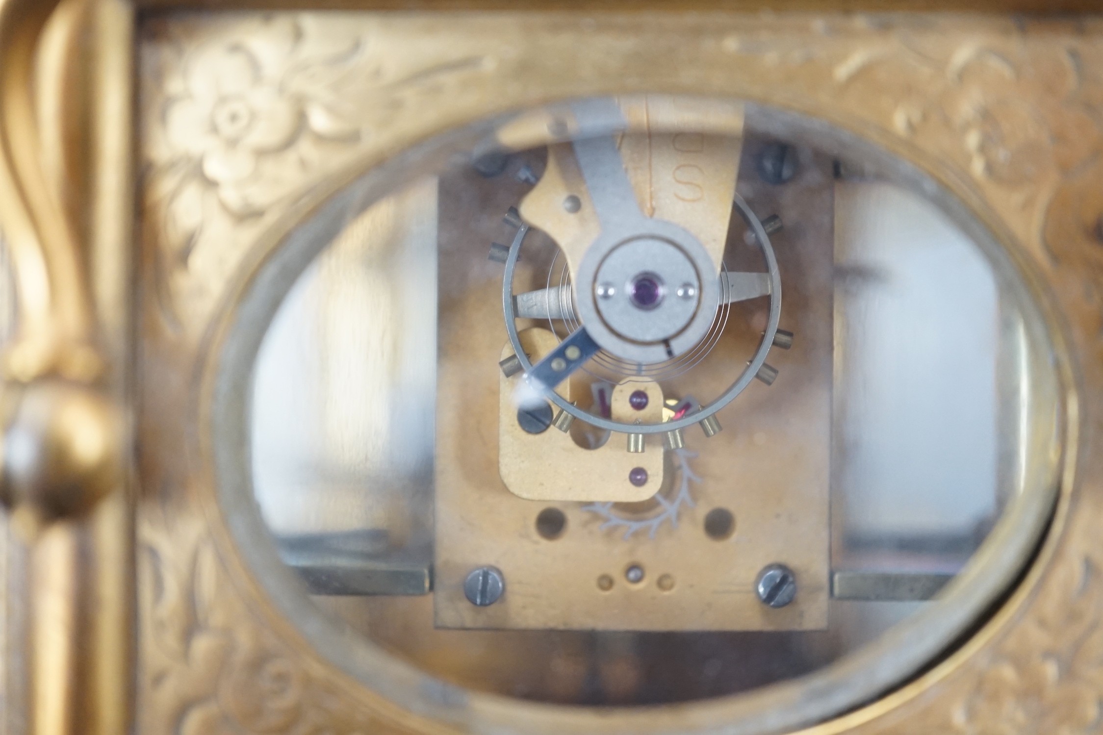 A late 19th century French eight day timepiece, in an engraved brass gorge case. 12cm tall - Image 5 of 6