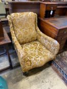 A late Victorian upholstered armchair, width 72cm, depth 80cm, height 90cm