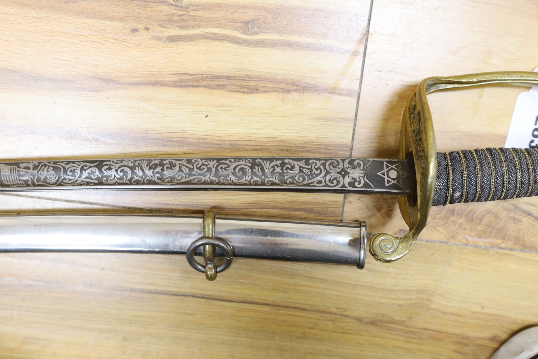 A United States Marines dress sword made by Wilkinson, the blade etched ‘S/SGT. JAMES P.S. - Image 4 of 6