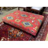 A large rectangular contemporary footstool upholstered in Kilim style fabric, length 122cm, depth