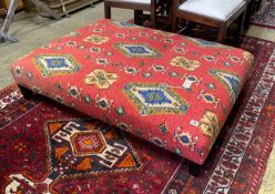 A large rectangular contemporary footstool upholstered in Kilim style fabric, length 122cm, depth