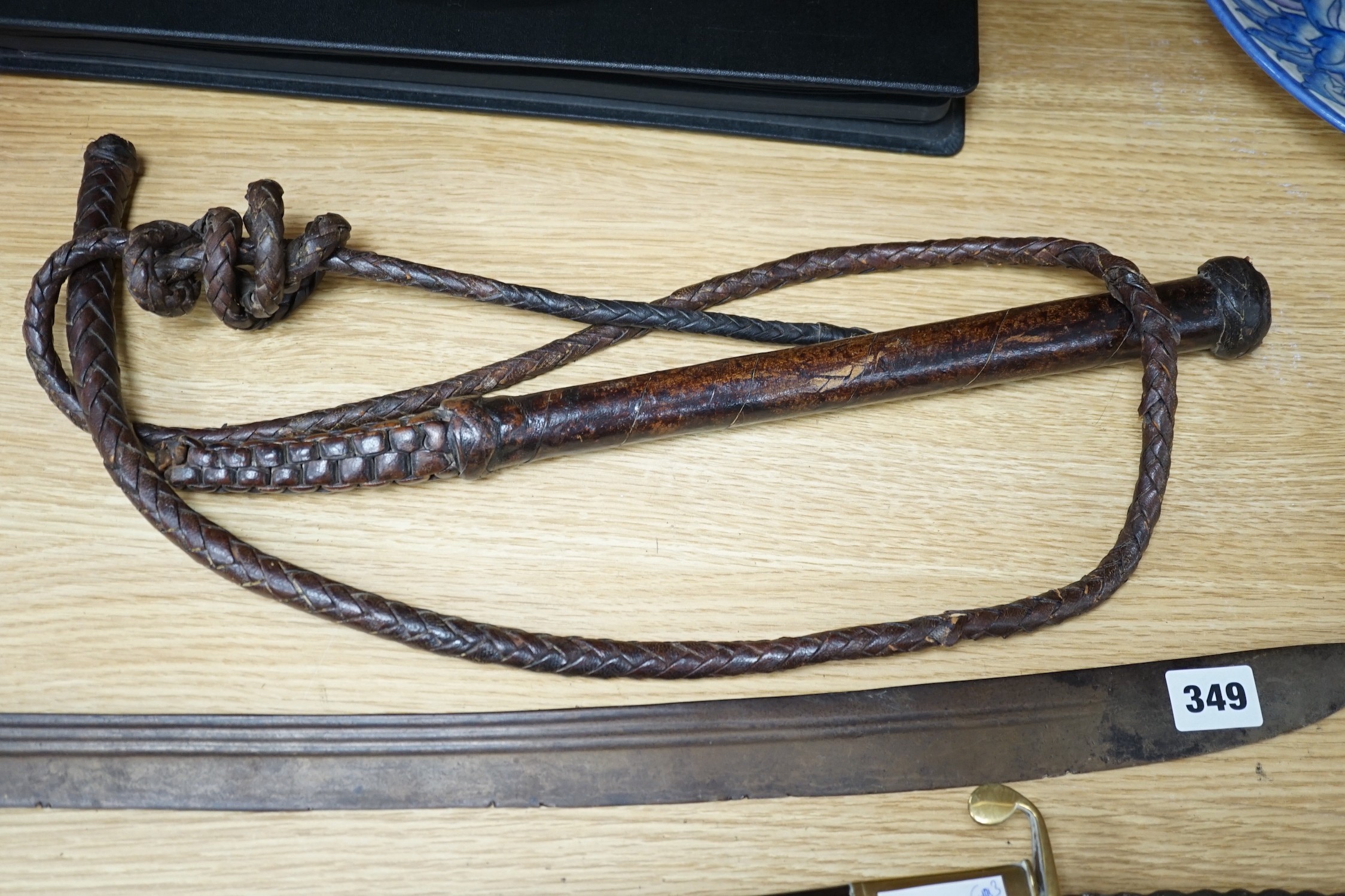 An Ottoman tulwar sabre, a European sabre and a leather whip - Image 2 of 7