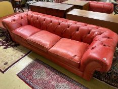 A Victorian style buttoned red leather Chesterfield settee, length 260cm, depth 90cm, height 68cm