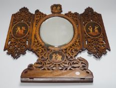 A 19th century fretted olivewood Sorrento ware toilet mirror, 45cm long