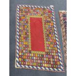 A Caucasian polychrome flat weave rug 134cm x 85cm.