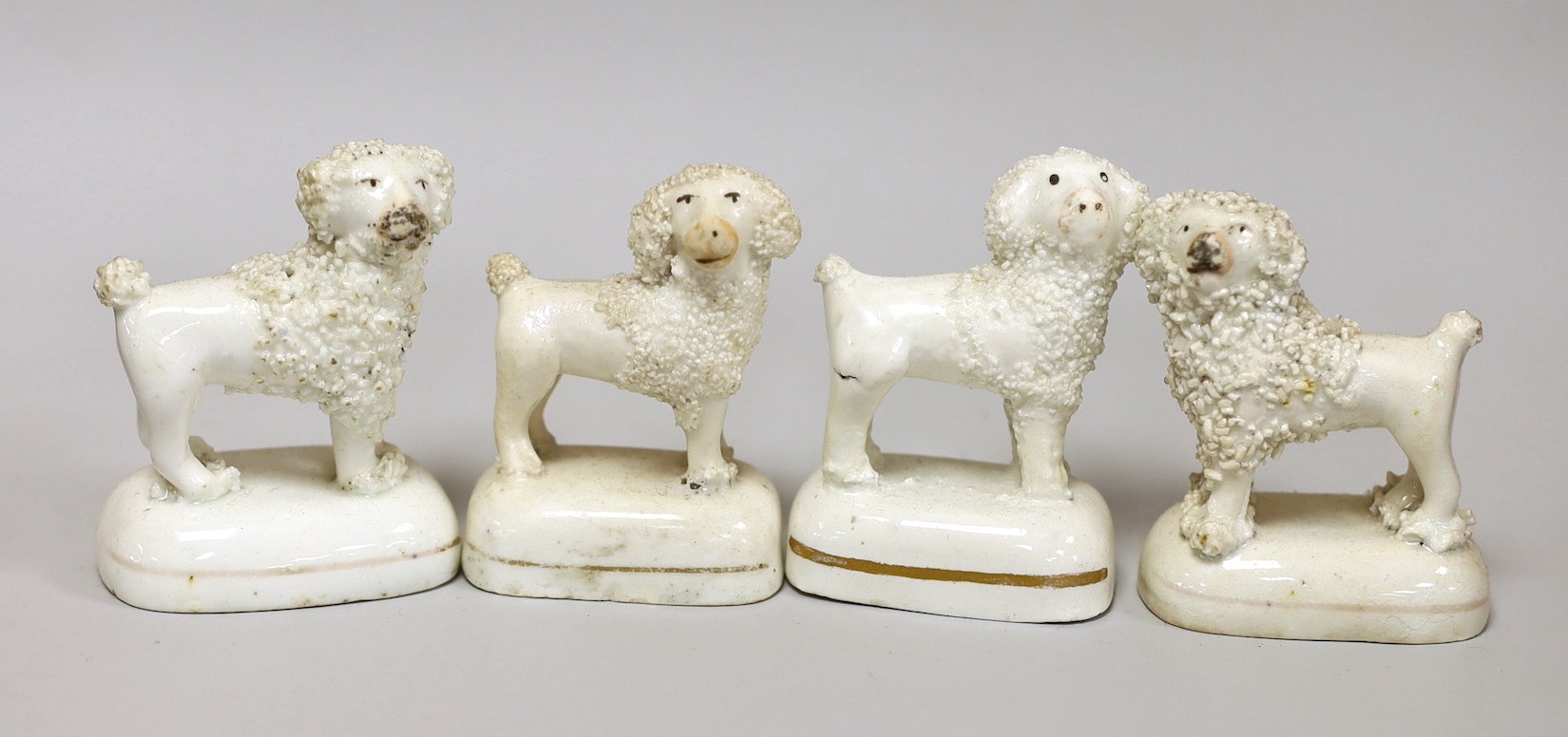 Four Staffordshire models of poodles, c.1830-50. Tallest 6.5cmProvence: Dennis G. Rice collection