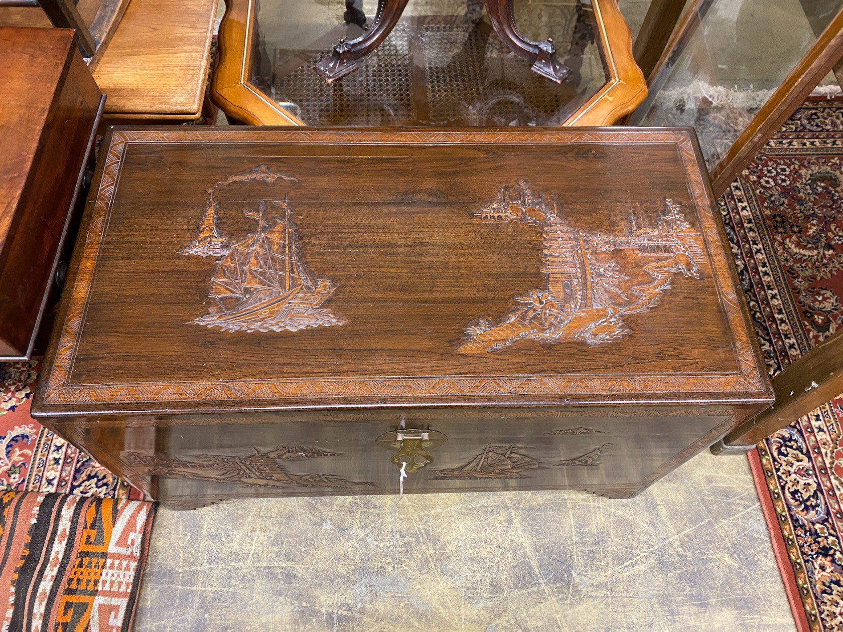 A 20th century Chinese carved camphorwood trunk, length 104cm, depth 52cm, height 62cm - Image 2 of 2