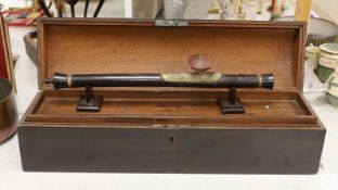A late 19th/early 20th century Chinese tigers eye mounted opium pipe with stand and box. Box 70cm