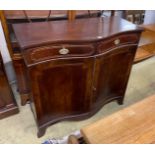 An Edwardian inlaid mahogany serpentine side cabinet, width 103cm, depth 48cm, height 96cm