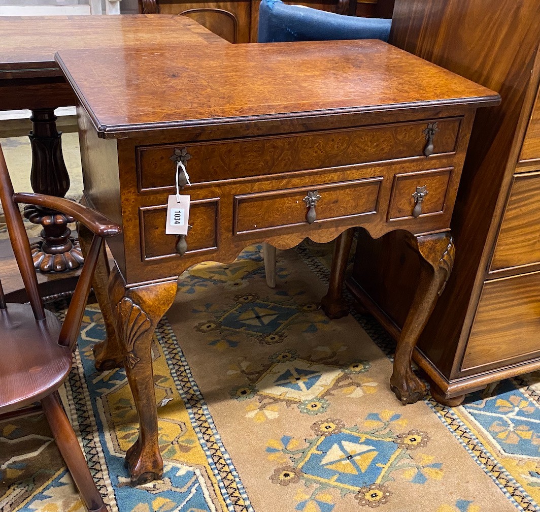 A reproduction George I style walnut and bird's eye maple lowboy, width 74cm, depth 45cm, height