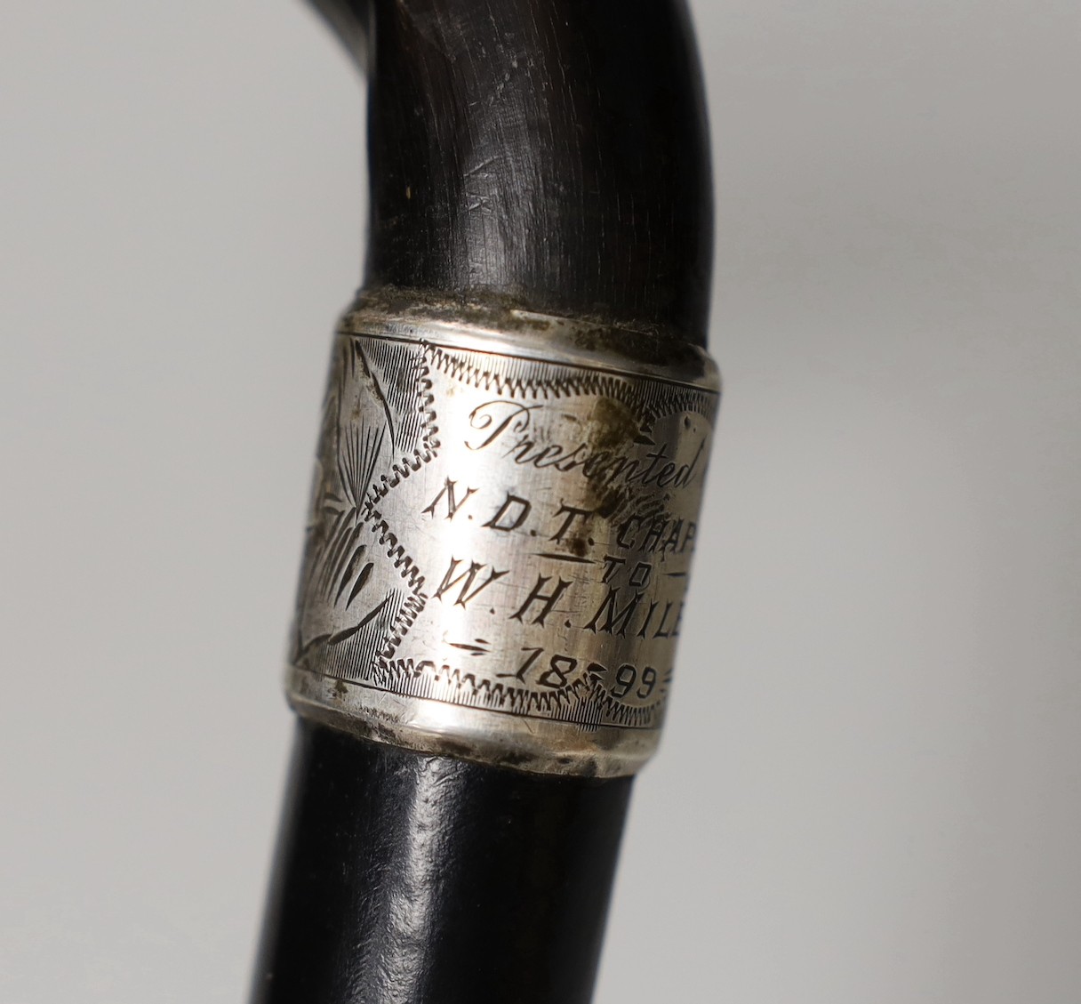 A silver mounted ebony cane with a phallic shaped handle, presented by N.D.T. Chapel to W.H. - Image 3 of 7