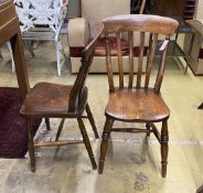 A set of six Victorian elm and beech Windsor lathe back kitchen chairs together with a circular part