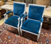 A pair of Louis XVI style painted upholstered fauteuil, width 56cm, depth 50cm, height 89cm
