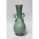 A Chinese celadon glazed two handled vase. 28cm high