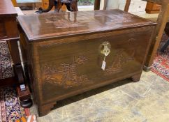 A 20th century Chinese carved camphorwood trunk, length 104cm, depth 52cm, height 62cm