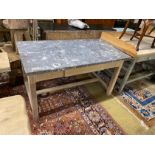 An early 20th century Continental bleached oak kitchen table with rectangular marble top, width