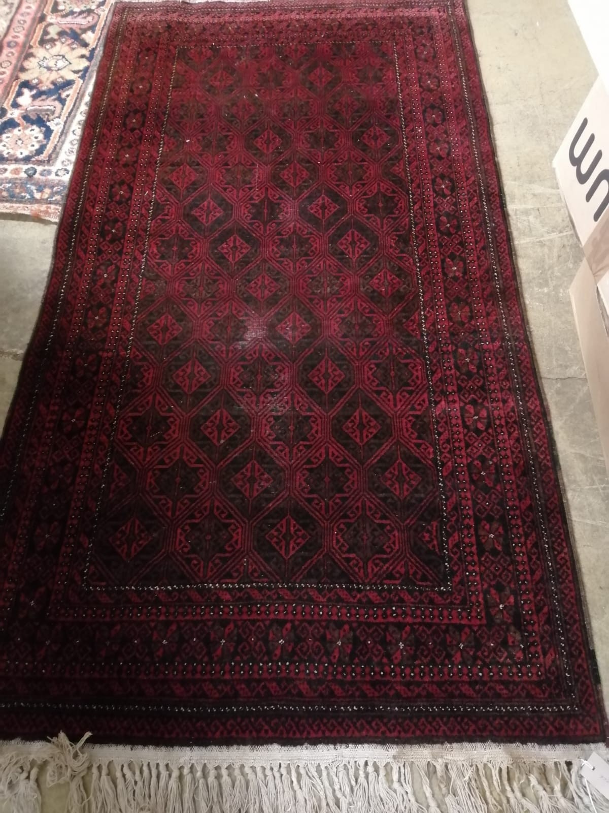 A Belouch geometric rug, 180 x 96cm