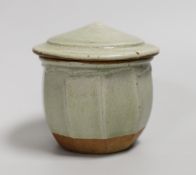 Richard Batterham (1936 – 2021), a cut sided stoneware jar and pointed cover with sage coloured