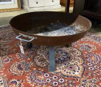 A circular metal firepit, diameter 75cm, height 38cm