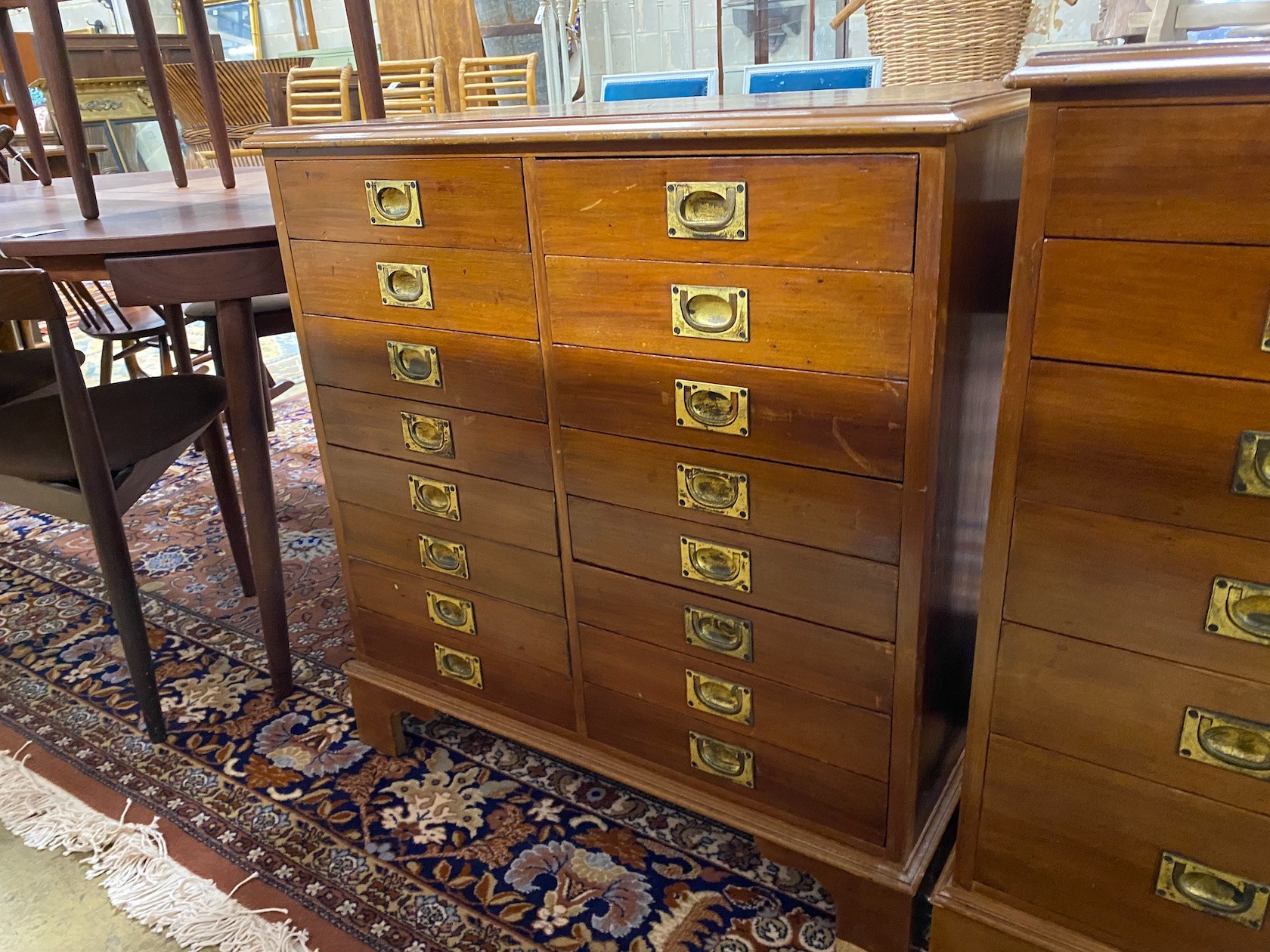 A near pair of mahogany and walnut military style chests of drawers, larger width 82cm, depth - Image 3 of 3