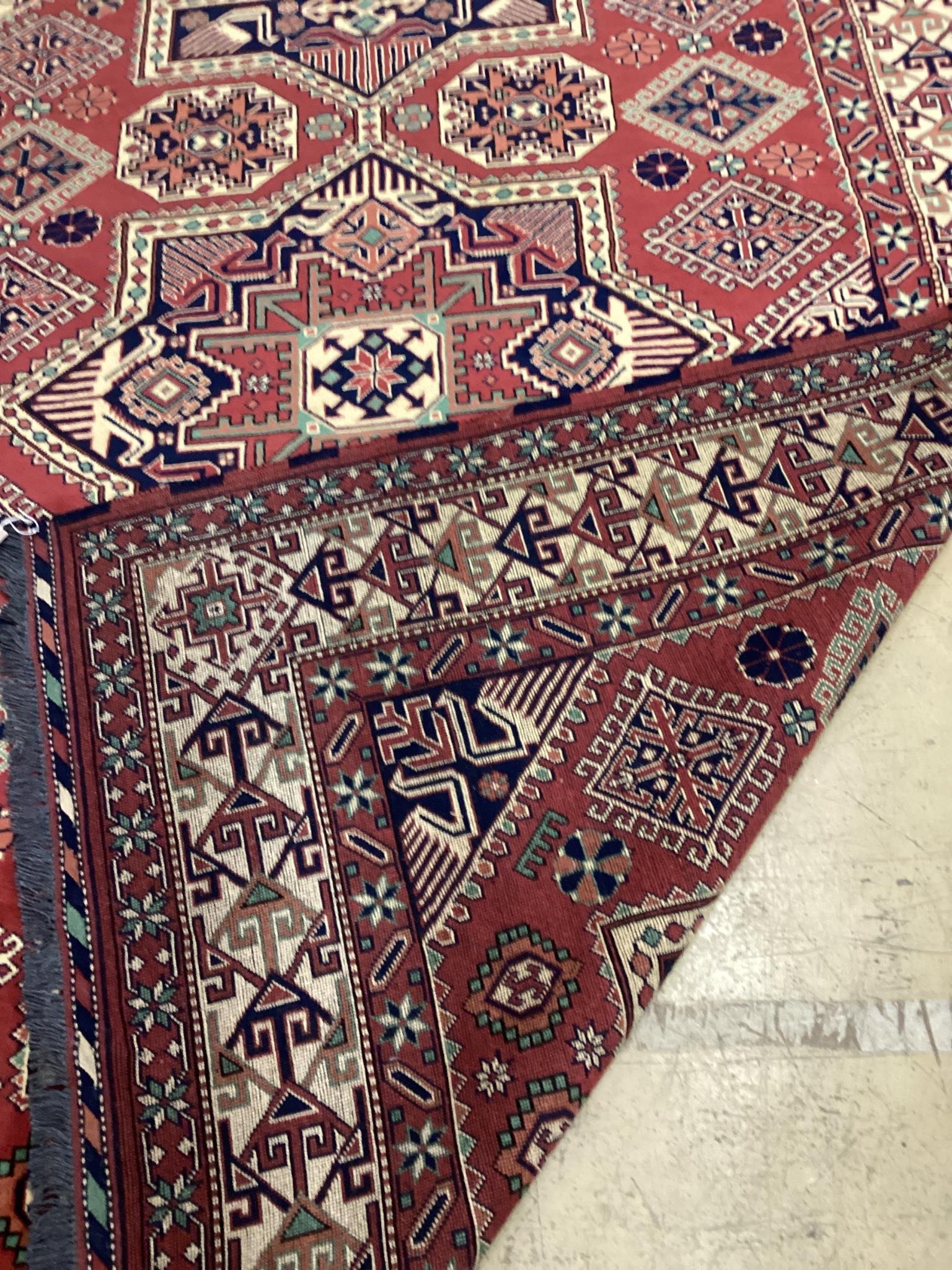 A modern Caucasian style red ground carpet 300cm x 210cm - Image 2 of 2