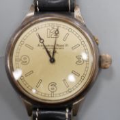 A Kriegsmarine style gun metal manual wind wrist watch, converted from a pocket watch, with later