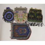 Two large metal framed Edwardian beaded bags, a later similar bead bag and a 1930’s metal framed bag