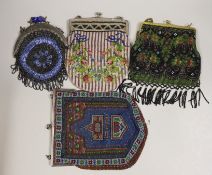 Two large metal framed Edwardian beaded bags, a later similar bead bag and a 1930’s metal framed bag
