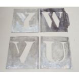 Two complete sets of alphabetic stencils; another part-set of 24, complete set of numerals, and