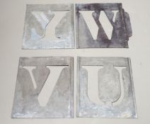 Two complete sets of alphabetic stencils; another part-set of 24, complete set of numerals, and