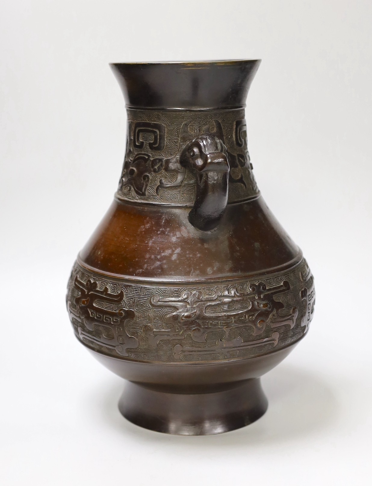 A Chinese archaistic bronze double handled 'hu' vase, 19th century, 27.5cm high - Image 3 of 5