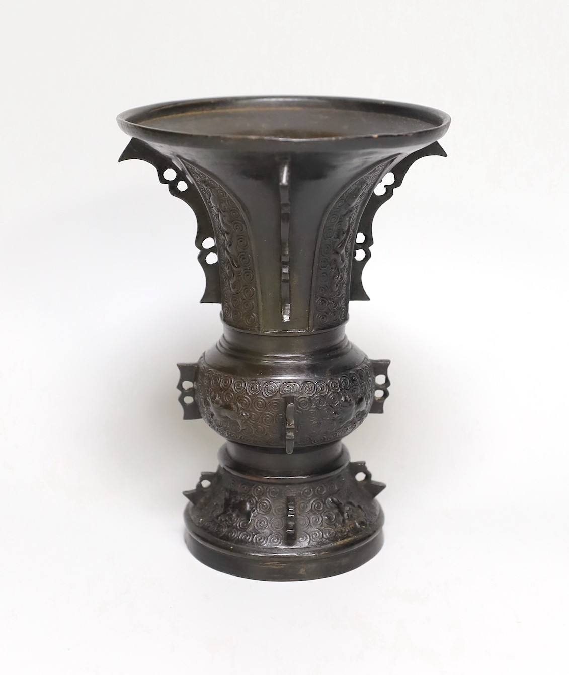 An 18th century Chinese bronze gu vase. 18cm high