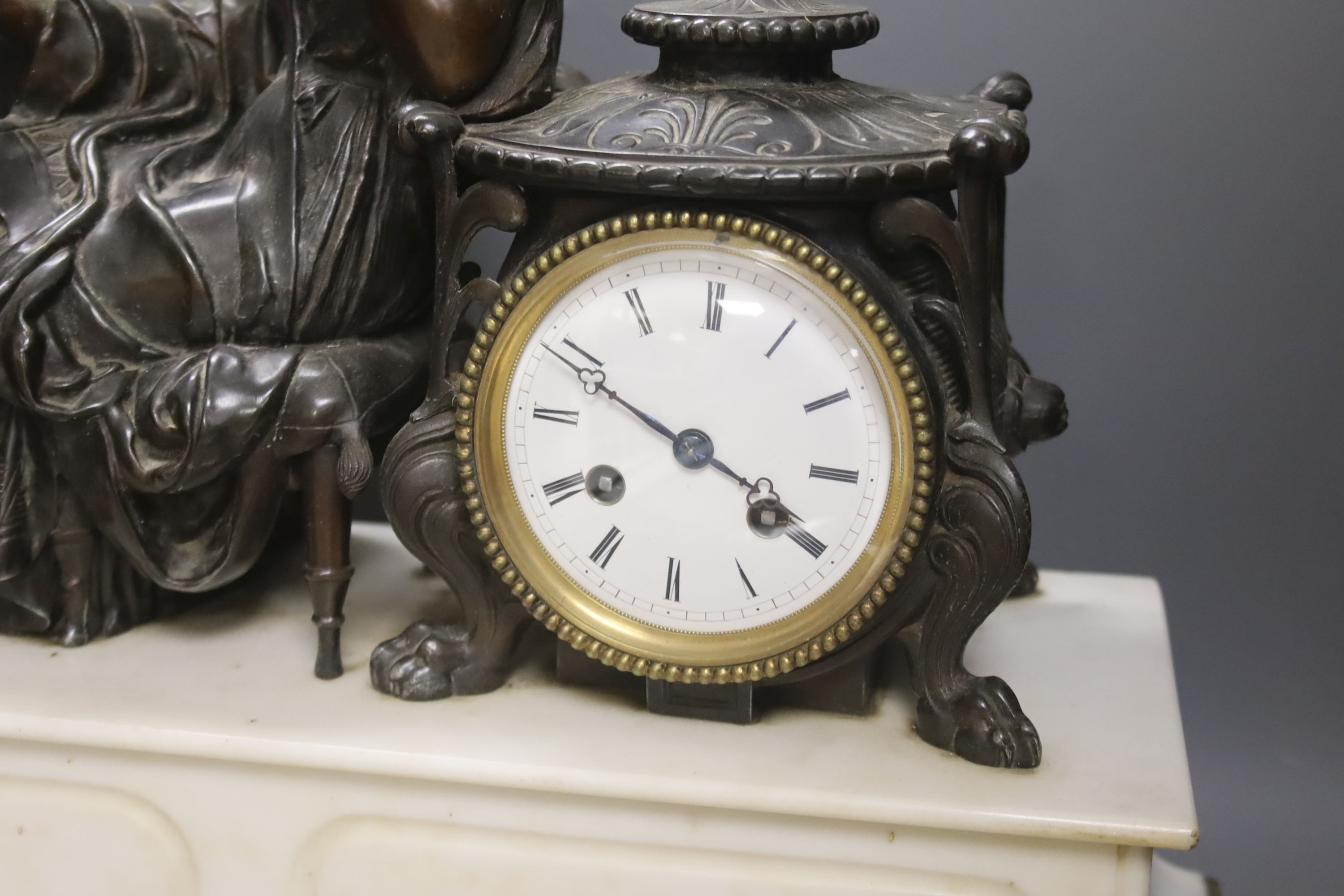 A French marble and bronzed metal figural mantel clock. 49cm - Image 2 of 4