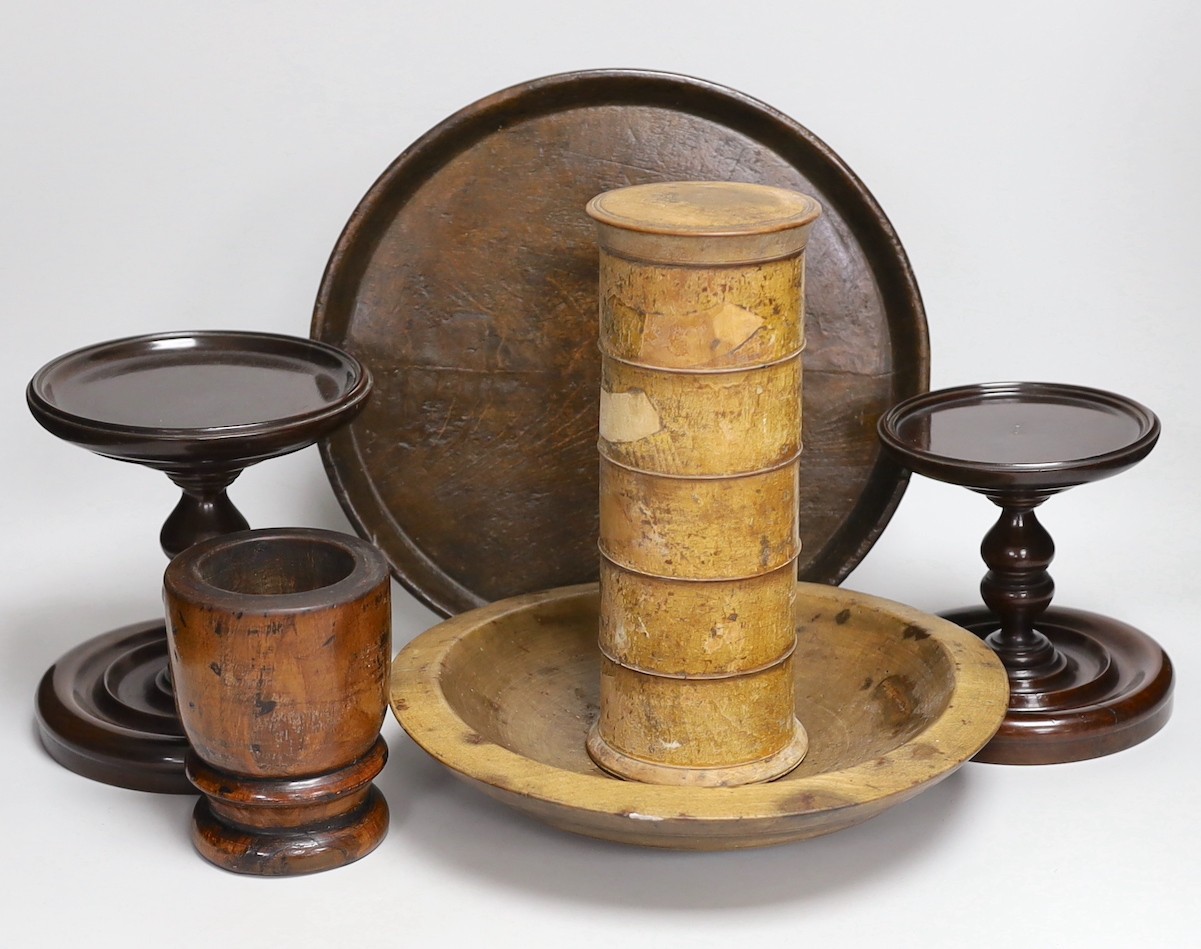 19th century and later treen including two mahogany candlestands, a spice tower and sycamore dish (6