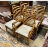 A set of four bamboo elbow chairs with upholstered seats, width 59cm, depth 48cm, height 99cm